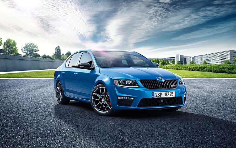 Sleek Skoda Rapid Cruising The Open Road Wallpaper