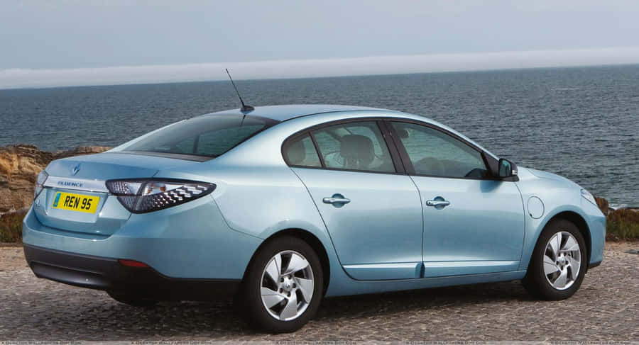 Sleek & Stylish Renault Fluence On The Road Wallpaper