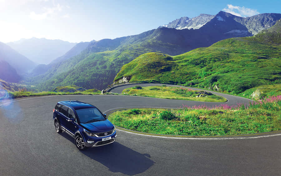 Sleek Tata Motors Vehicle On The Road Wallpaper