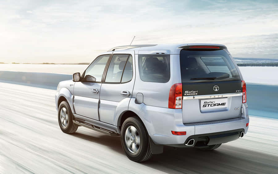 Sleek Tata Motors Vehicle On The Road Wallpaper