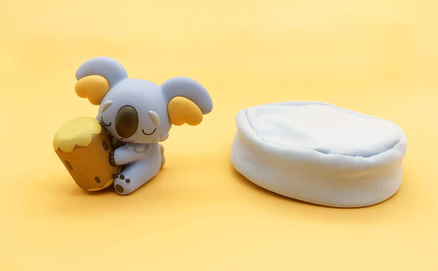 Sleeping Komala With Cushion Wallpaper