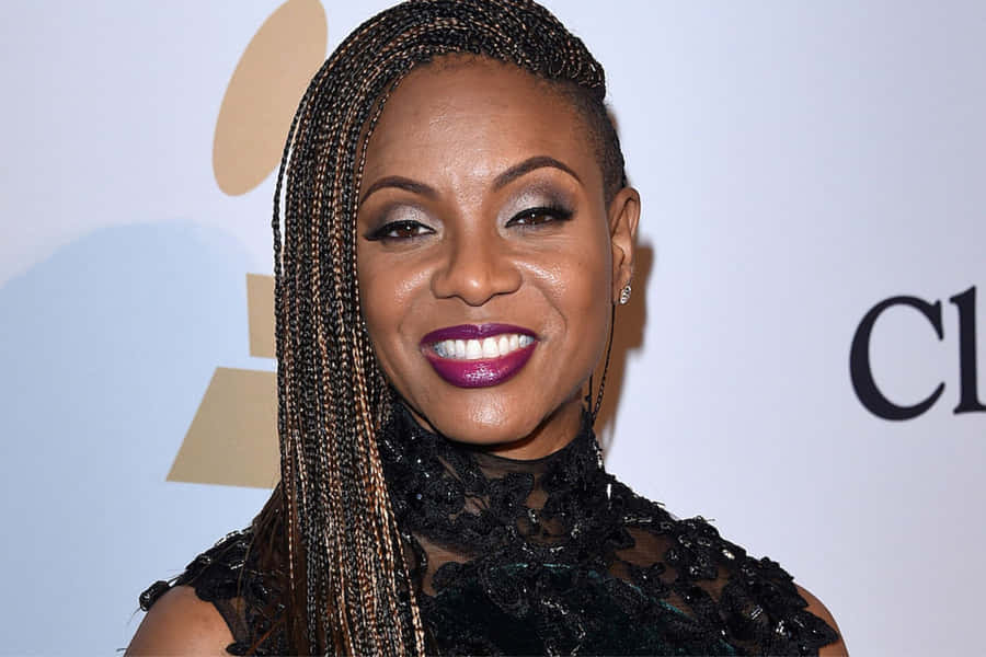 Smiling Celebrityat Event Wallpaper