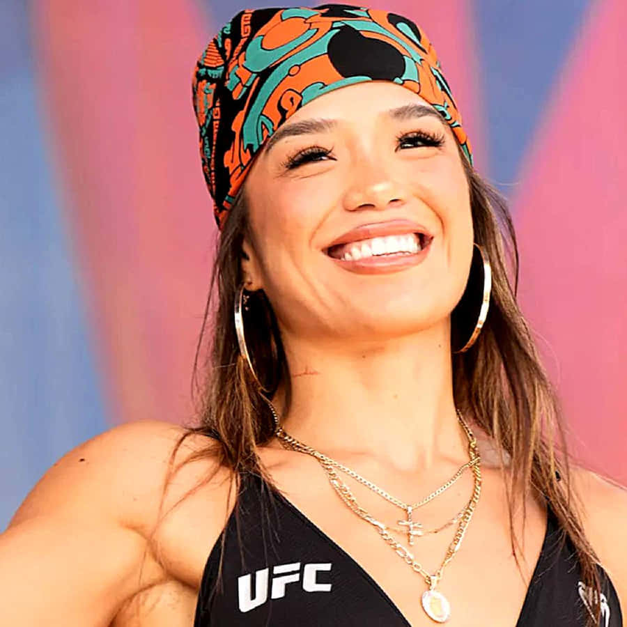 Smiling Female Athlete U F C Apparel Wallpaper