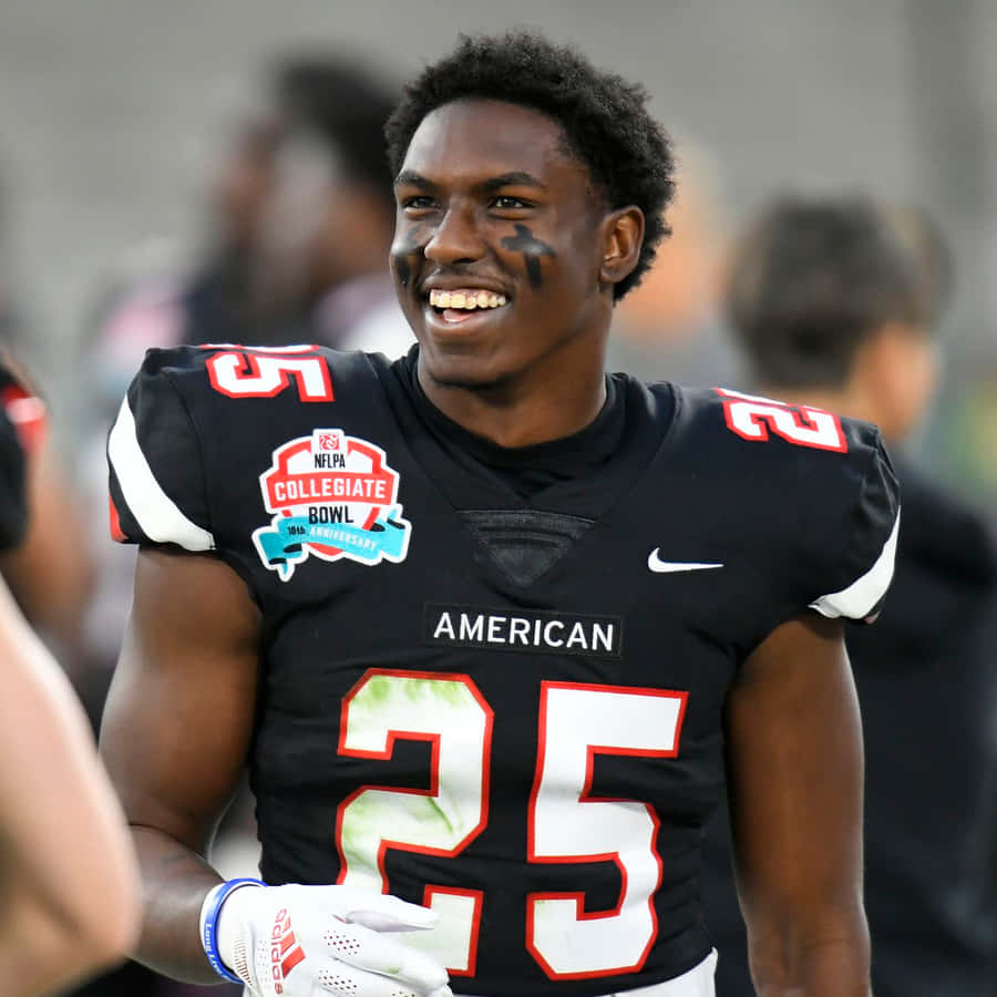 Smiling Football Player Number25 Wallpaper