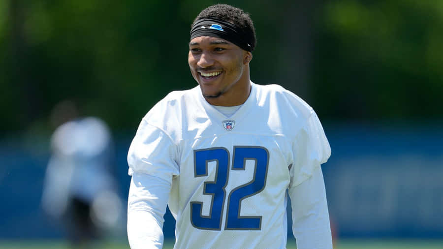 Smiling Football Player32 Outdoors Wallpaper