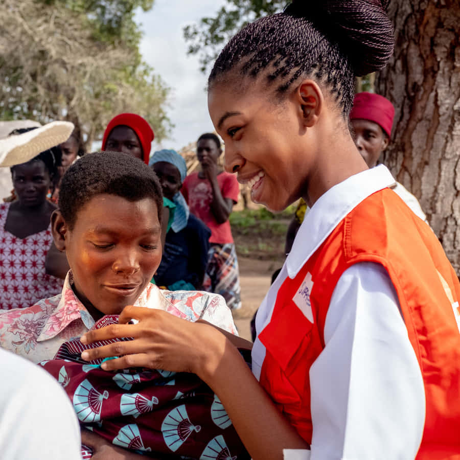 Smiling Humanitarian Worker Wallpaper