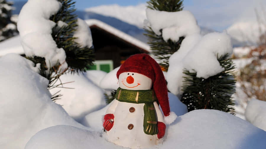 Snowman Wearing Christmas Hat Wallpaper