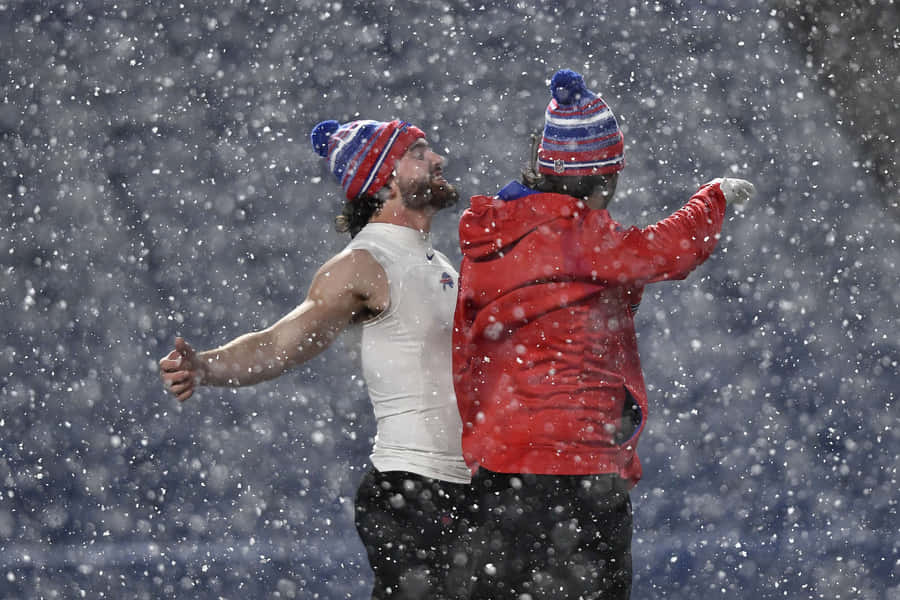 Snowy Football Celebration Wallpaper