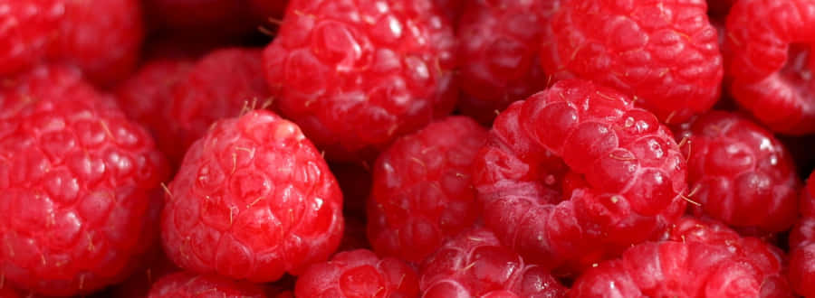 Snowy Mountainscape At Sunrise Wallpaper