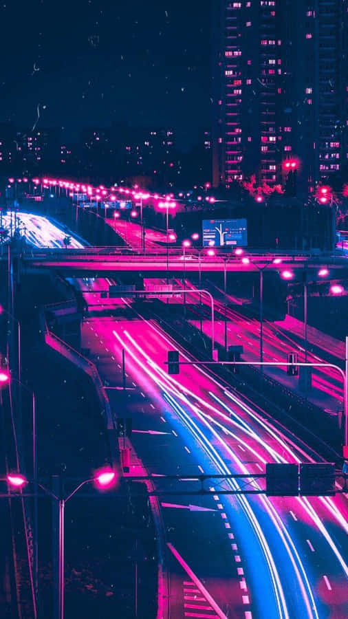 Soaking In The Neon City Glow Wallpaper