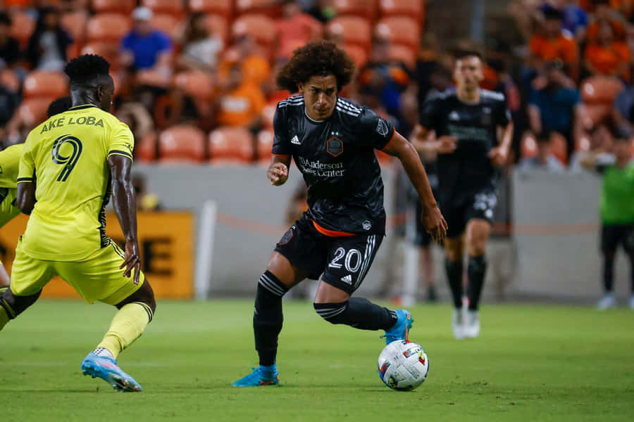 Soccer Action Ake Lobaand Opponent Wallpaper