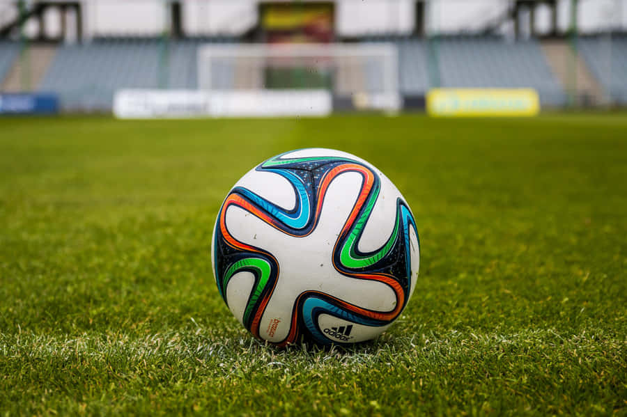 Soccer Ball On Football Field Wallpaper