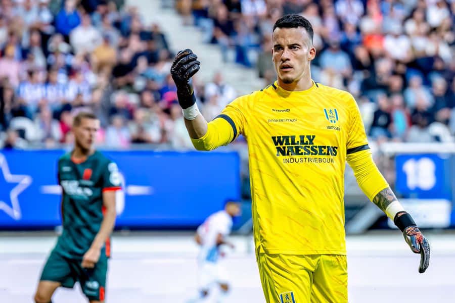 Soccer Goalkeeper Commanding Defense Wallpaper