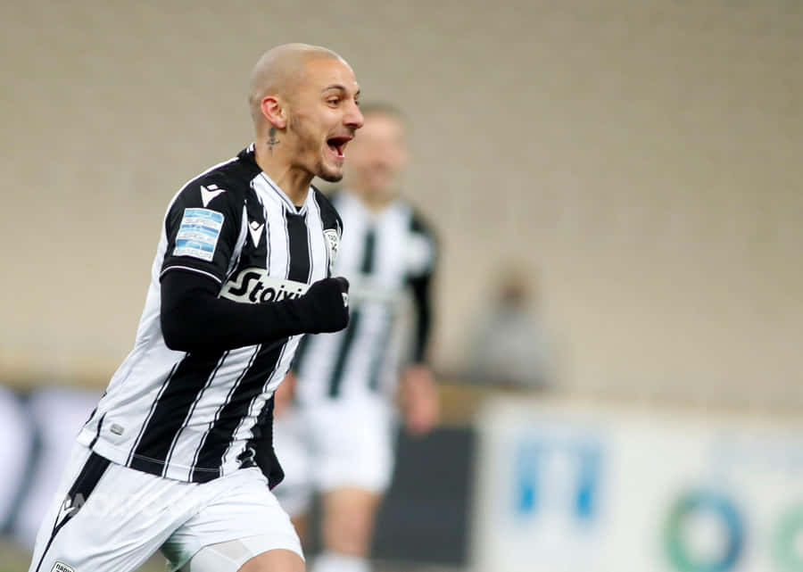 Soccer Player Celebration Moment Wallpaper