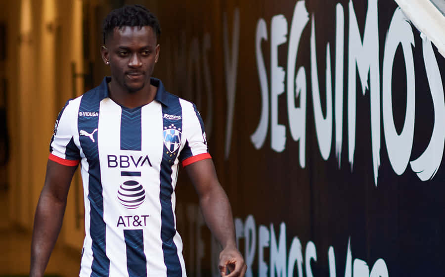 Soccer_ Player_in_ Striped_ Uniform Wallpaper