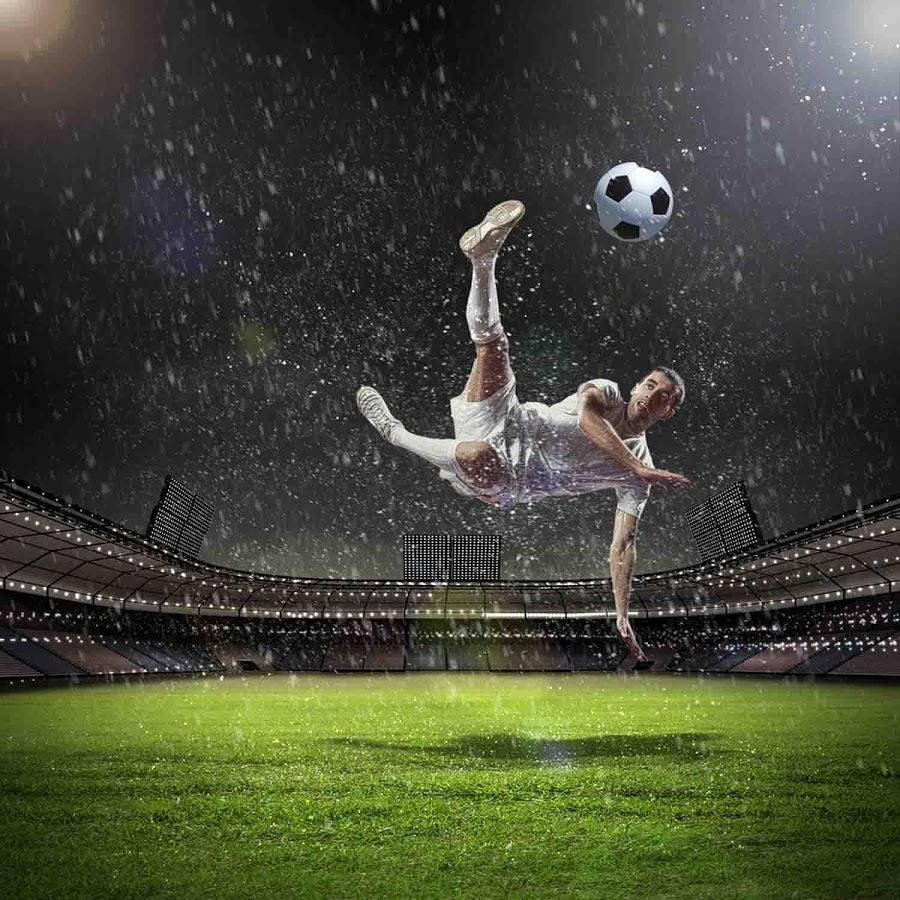 Soccer Player Kicking The Ball Wallpaper