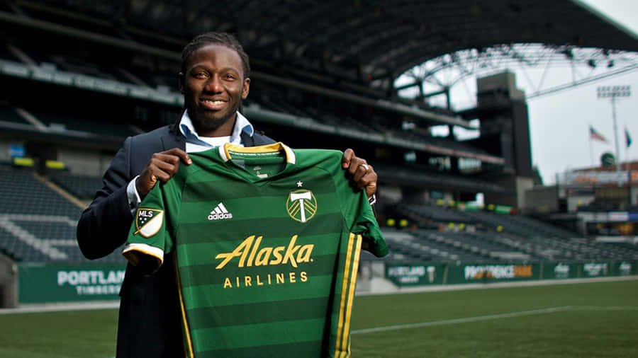 Soccer Player Presenting New Jersey Wallpaper