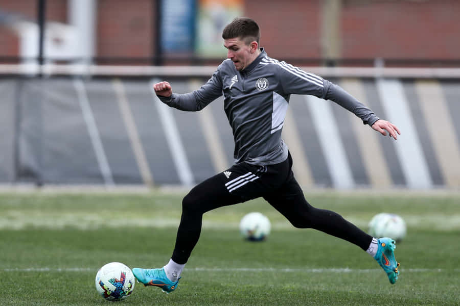 Soccer Player Training Session Wallpaper