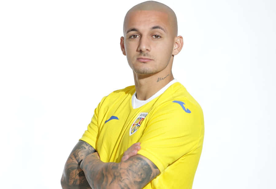 Soccer Playerin Yellow Jersey Wallpaper