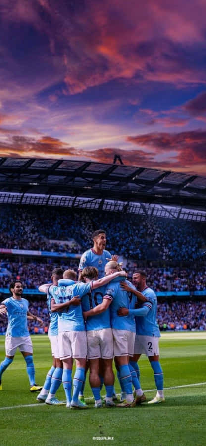 Soccer Team Celebrationat Dusk Wallpaper
