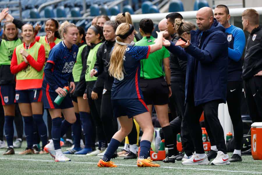 Soccer Team Celebrationwith Coach Wallpaper