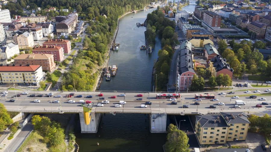 Sodertalje Aerial Viewof Bridgeand Canal Wallpaper