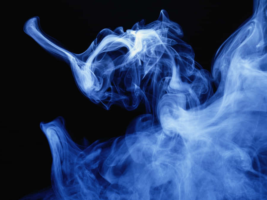 Soft Blue Smoke Evokes A Sense Of Tranquility Wallpaper