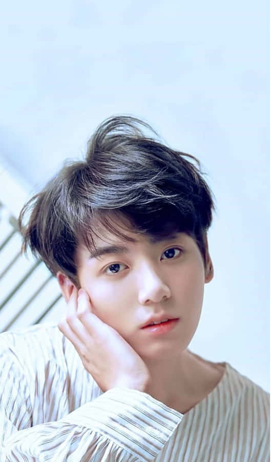 Soft Gaze Portrait Young Man Wallpaper