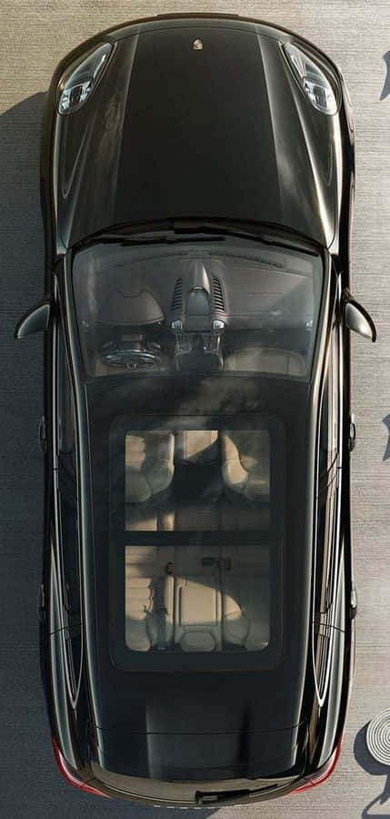 Spacious Family Car On A Scenic Road Trip Wallpaper