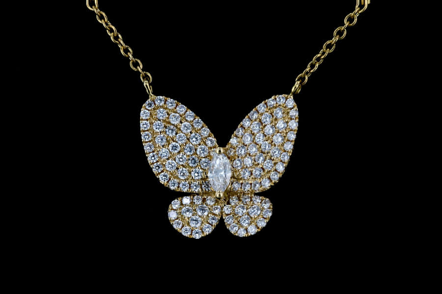 Sparkling Butterfly Pendant Gold Chain Wallpaper