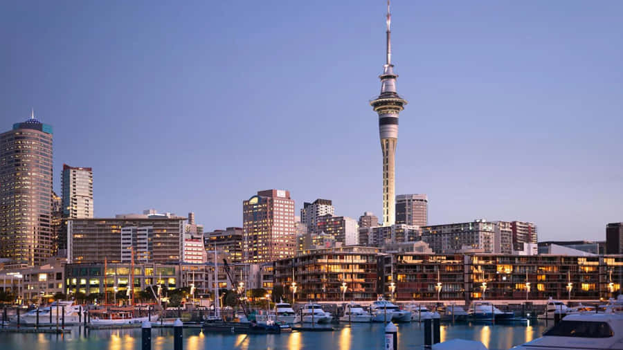 Spectacular Skyline Of Auckland At Dusk Wallpaper