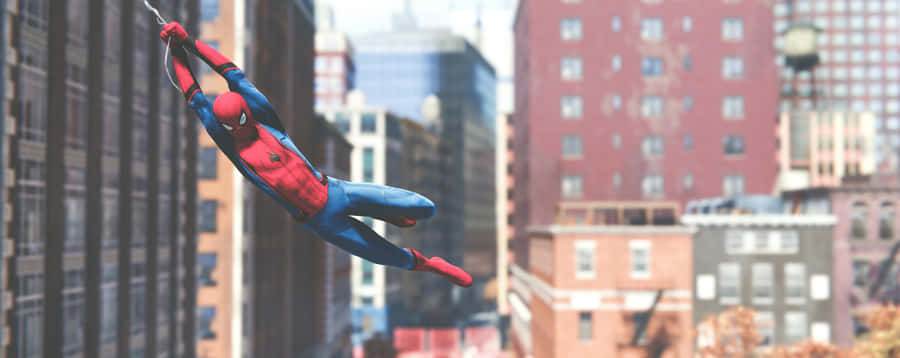 Spectacular Spider-man Web Slinging Across The City Wallpaper