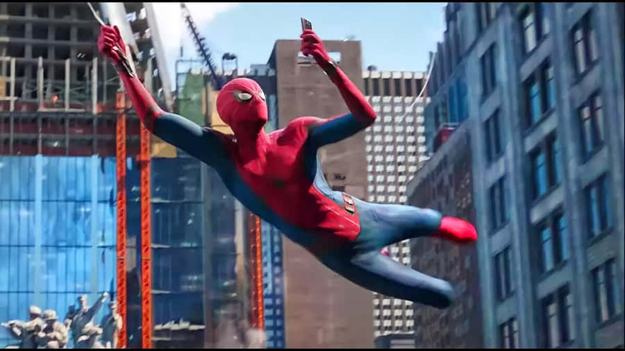 Spider-man Swinging Through The City Wallpaper