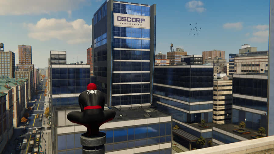 Spiderman Perched Above Oscorp Building Wallpaper