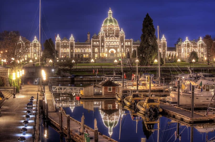Splendid Night View Of Parliament Buildings In British Columbia Wallpaper