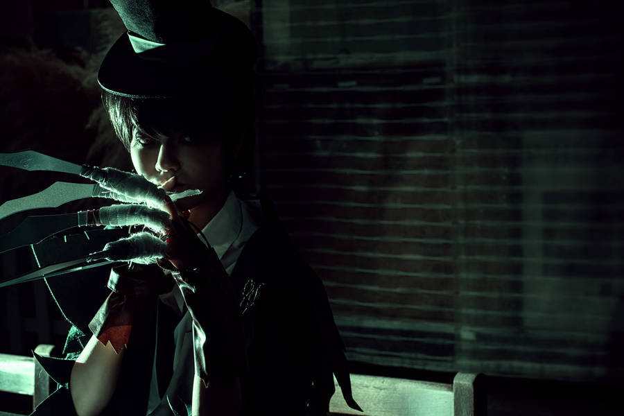 Spooky Girl With Sharp Claws Wallpaper