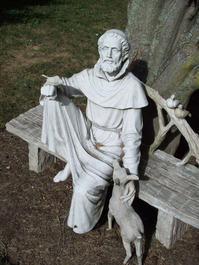 St Francis Assisi Statuewith Animal Wallpaper