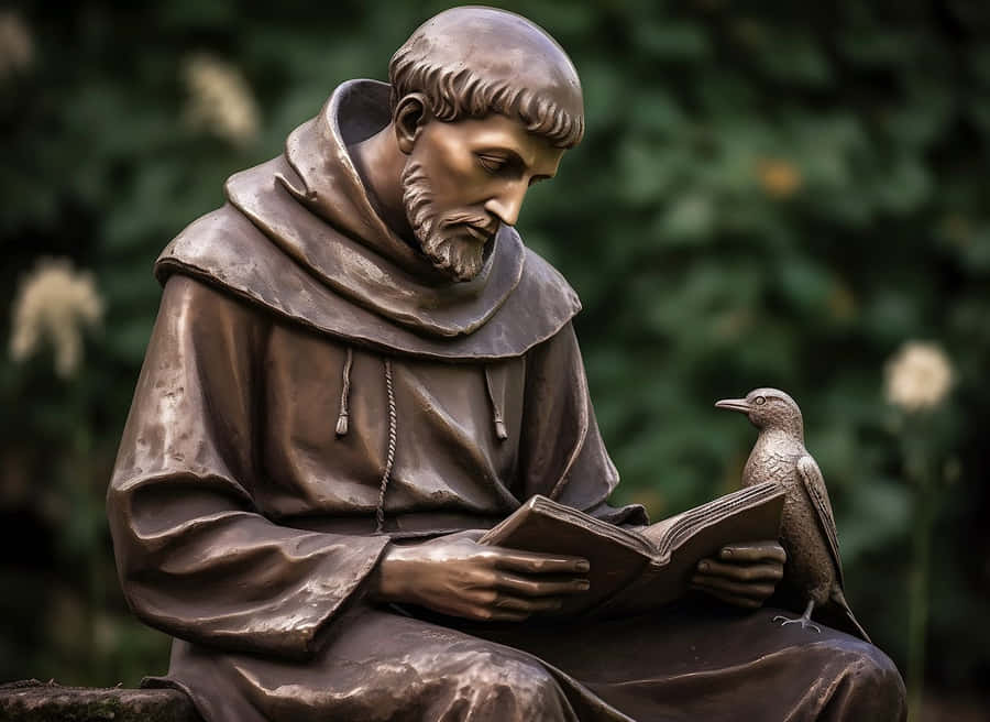 St Francis Statue With Bird Wallpaper