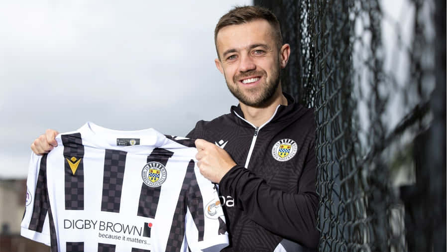St Mirren Player Holding New Kit Wallpaper