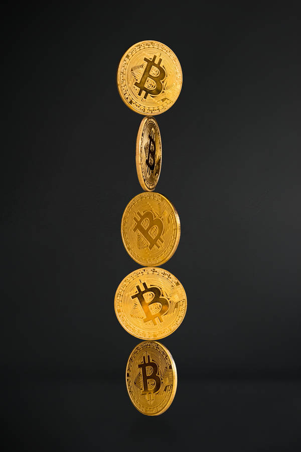 Stack Of Cryptocurrency Coins Wallpaper