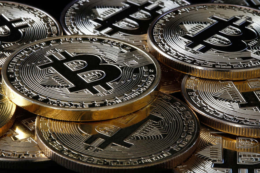 Stacked Crypto Coins Wallpaper