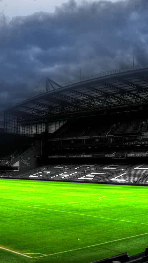 Stadium Silhouette Under Stormy Skies Wallpaper