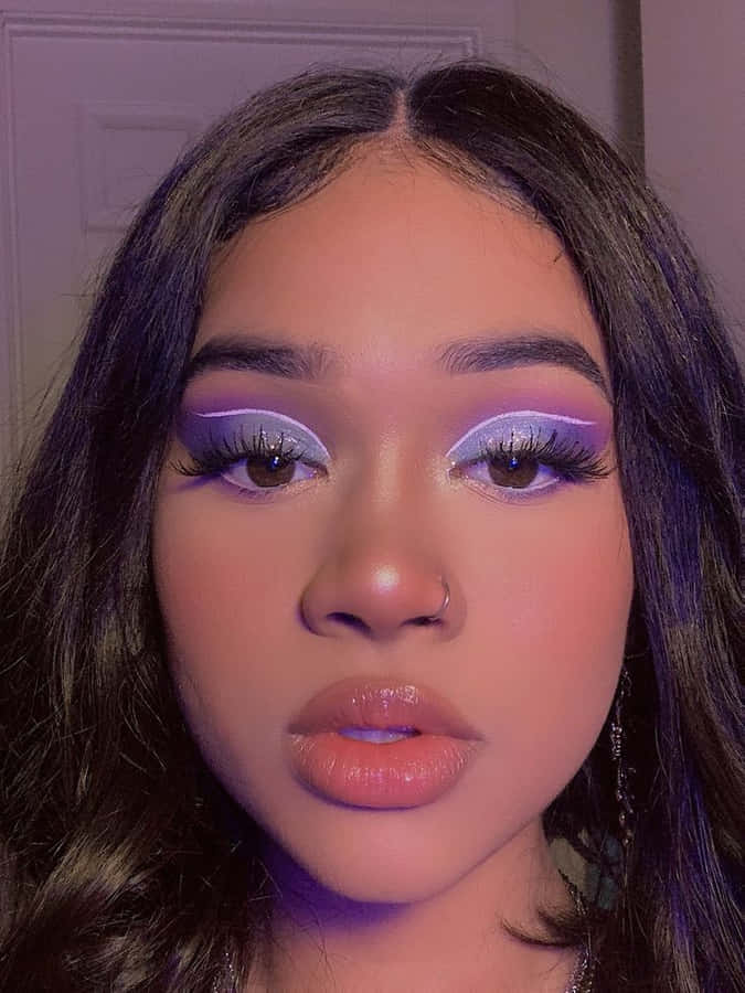 Stand Out From The Crowd With Purple Eye Shadow Wallpaper