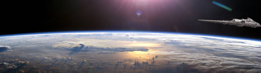 Star Wars Dual Screen Battlestar Over Planet Wallpaper