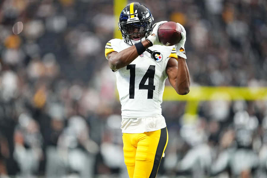 Steelers Player Catching Football Wallpaper