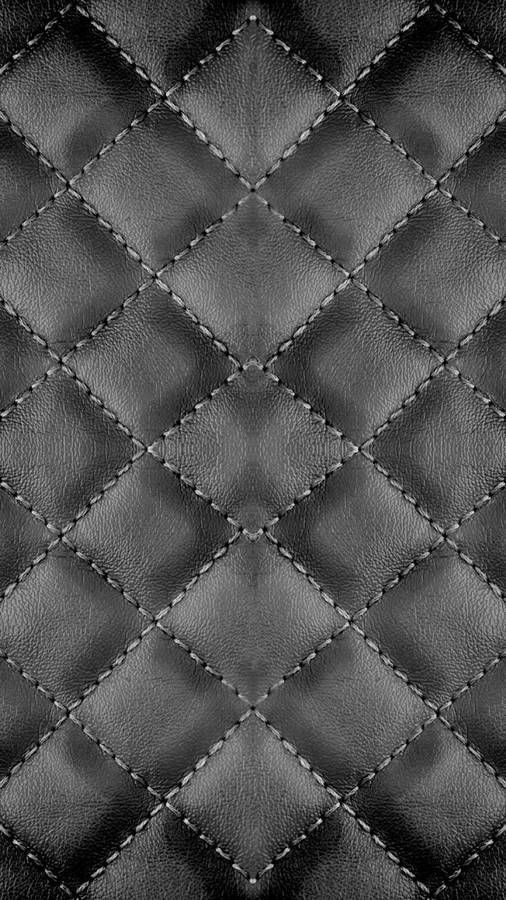 Stitched Upholstery Made Of Black Leather Iphone Wallpaper