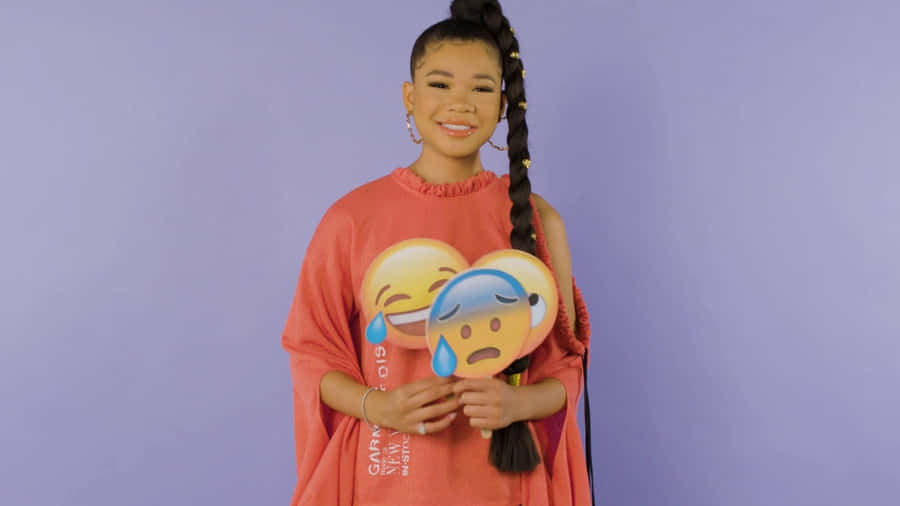 Storm Reid Holding Emoji Props Wallpaper