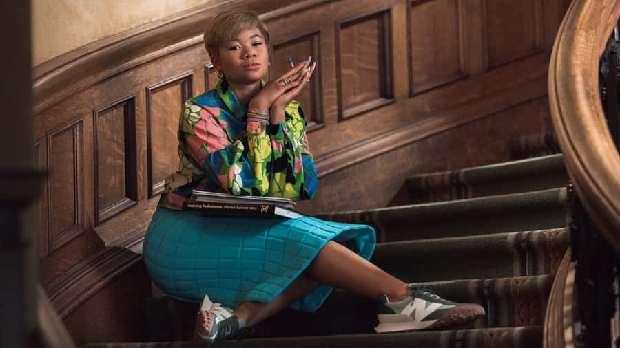 Storm Reid Sitting On Stairs Wallpaper