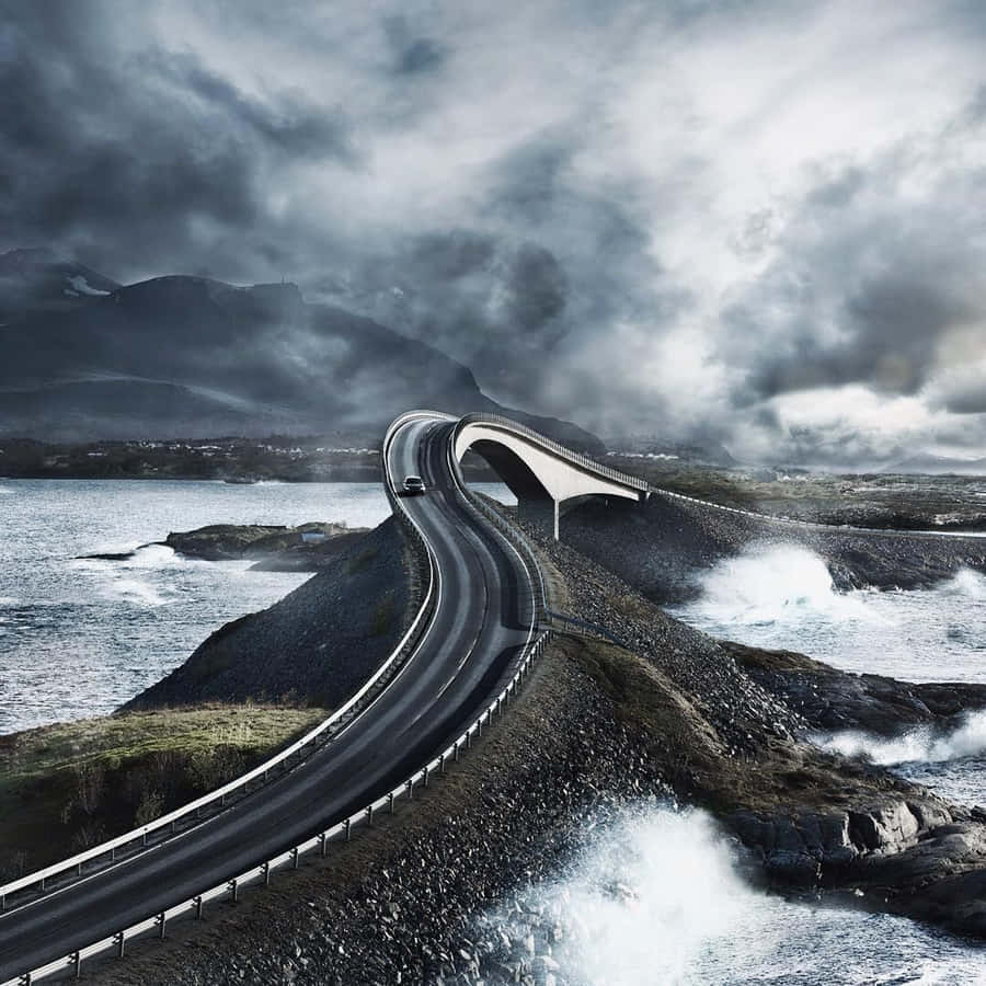 Storseisundet Bridge With Dark Clouds Wallpaper