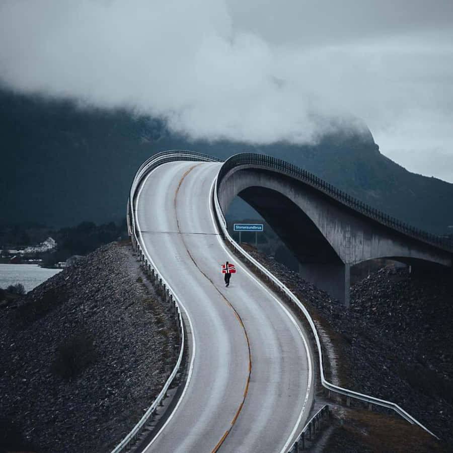 Storseisundet Bridge With Norwegian Flag Wallpaper
